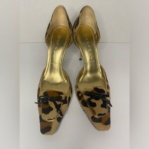 Casadei leopard dorsey cut pump with gold heel 4" heel black patent bow